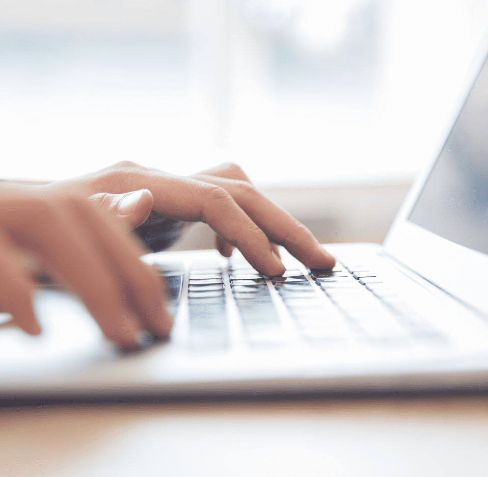 close-up-male-hands-typing-laptop-keyboard